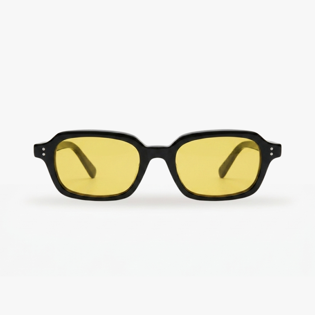 Sunglasses with black frame and yellow lenses on a white background